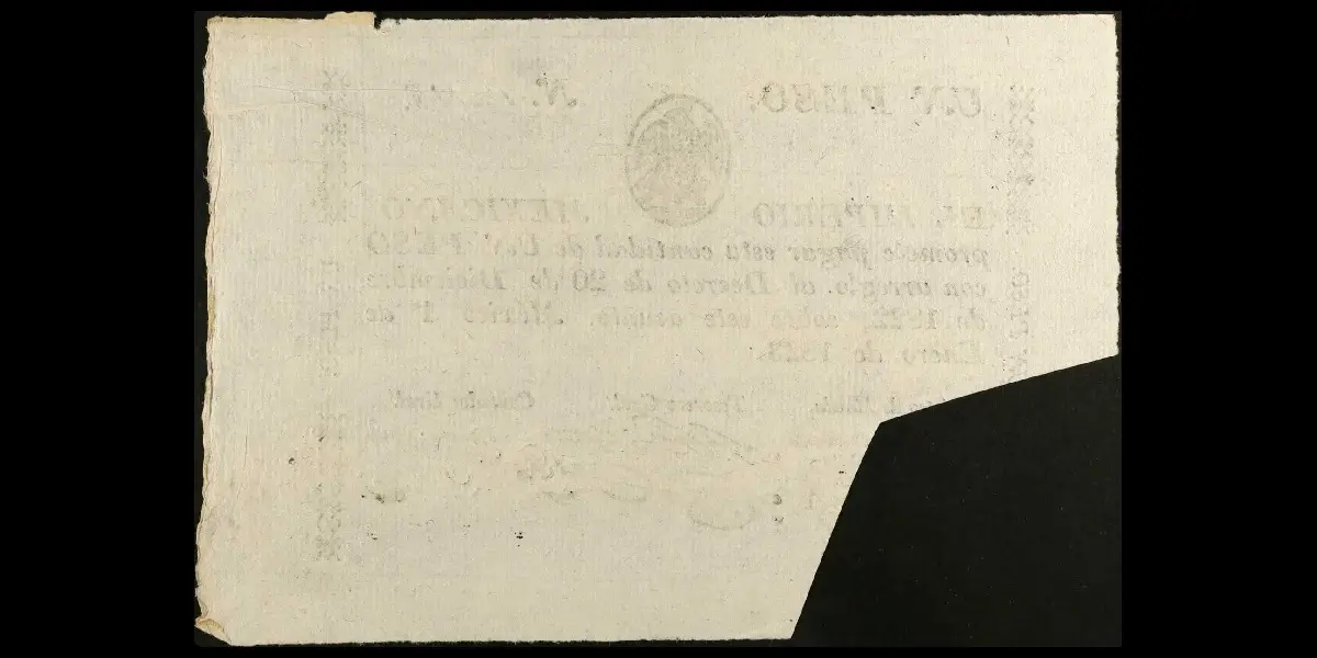 Billete de 1 peso del Imperio Mexicano cancelado por corte completo reverso
