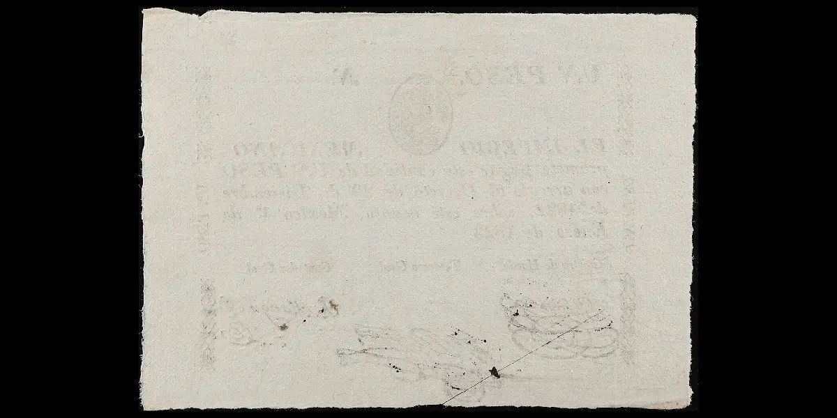 Billete de 1 peso del Imperio Mexicano cancelado por corte reverso