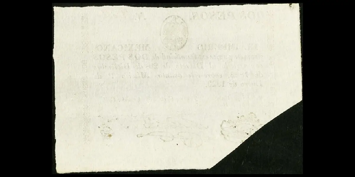 Billete de 2 pesos del Imperio Mexicano cancelado por corte completo reverso